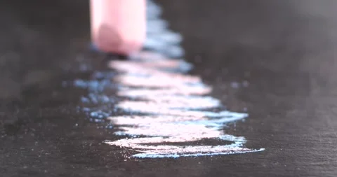 Chalk drawing on black surface with pink and blue colors Stock Footage 341273111