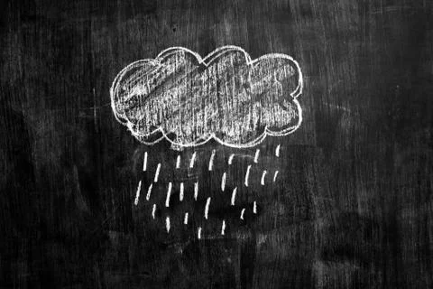 Chalk drawing of raincloud on blackboard Photos