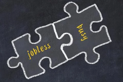 Chalk drawing of two puzzles with words jobless and busy. Concept of solving  イラスト素材