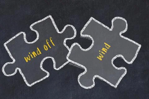 Chalk drawing of two puzzles with words wind off and wind. Concept of solving Stock Illustration