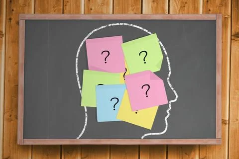 Chalk head with question mark post it notes Stock Photos