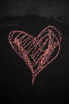 Chalk Heart Drawing on Dark Surface Represents Love for Valentines Day Stock Photos