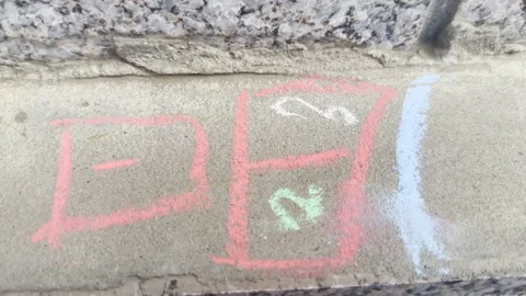 Chalk Numbers Written on Concrete Surface Stock Footage 333618797