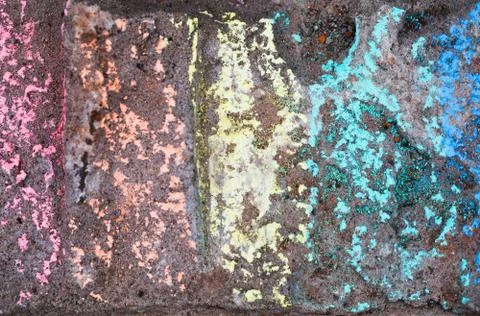 Chalk rainbow pattern over grunge concrete wall Stock Photos