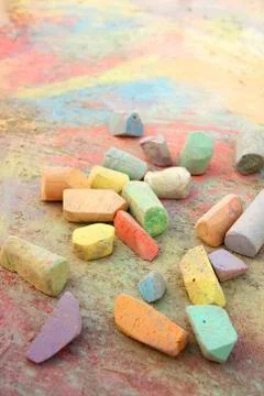 Chalk scattered on sidewalk Stock Photos