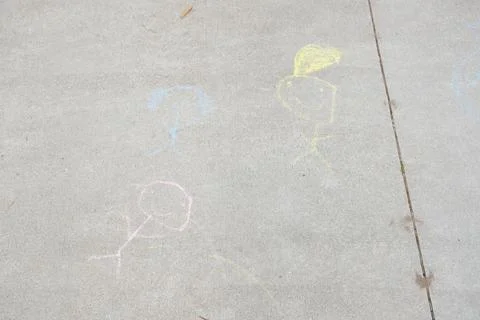 Chalk sidewalk stick art drawn by children Stock Photos
