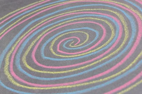 Chalk with spin cycle on chalkboard background 写真素材