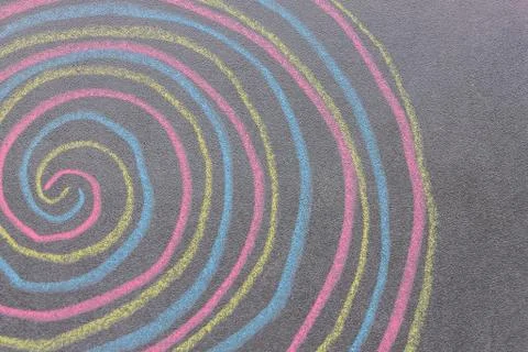 Chalk with spin cycle on chalkboard background 写真素材