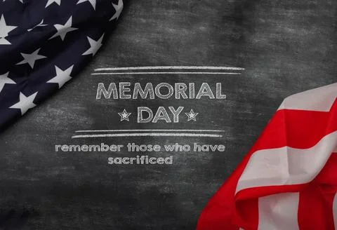 Chalk text on blackboard surrounded by the flag of the United States of America Foto stock