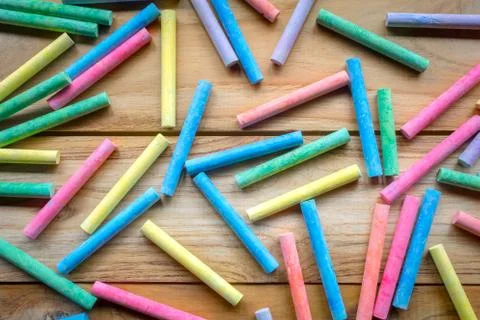 Chalk on wood table background Stock Photos