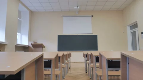 Chalkboard And Projector Screen In Empty Lecture Hall, College Classroom Stock Footage 172365673