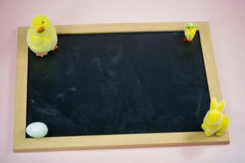 Chalkboard with chicks and easter egg Stock Photos