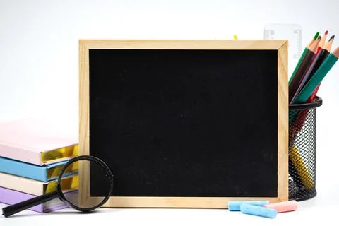 Chalkboard featuring an array of School Supplies designed for Creative and .. Stock Photos