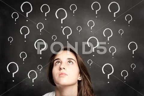 Chalkboard with interrogation symbols Stock Photos