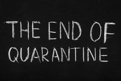 Chalkboard text message The end of qarantine Stock Photos