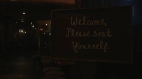 Chalkboard Welcome Sign Inside Dimly Lit Restaurant 動画素材 343953841