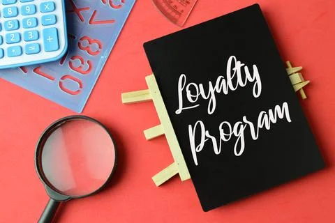 Chalkboard written with text LOYALTY PROGRAM. Top view. Fotos de archivo