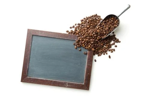 Chalkbooard and coffee beans. Stock Photos