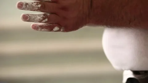 Chalking hands 2 Stock Footage 310630648
