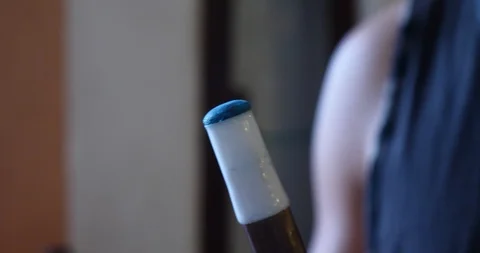 Chalking a pool cue stick Stock Footage 118867255