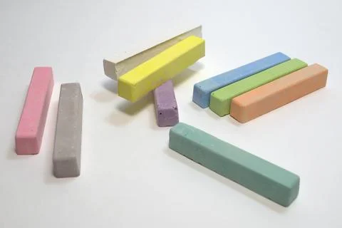 Chalks for kids creativity and simple drawing. Multicolored set, scattered Stock Photos