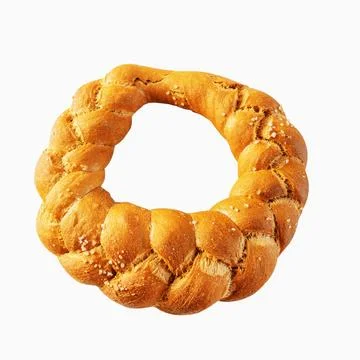 Challah, a braided bread ring. Round white wheat bread with coarse salt. The Stock Photos