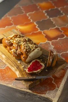Challah bread with jam and almonds for breakfast Stock Photos