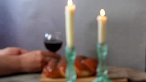 Challah bread, shabbat wine and candles on wooden table. Stock Footage 159446522