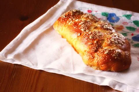 Challah bread on wooden table Stock Photos