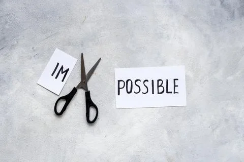 Challenge concept. Word Impossible becomes Possible Stock Photos