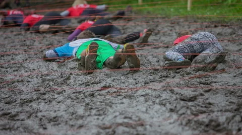 Challenge game in the mud Stock Footage 63766036