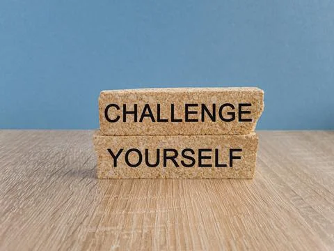 Challenge yourself symbol. Brick blocks with words Challenge yourself. Stock Photos