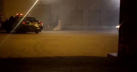Challenger Skids to Stop Outside Warehouse Stock Footage 60680557