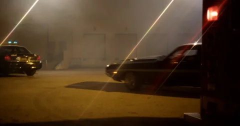 Challenger Skids to Stop Outside Warehouse Stock Footage 60680589