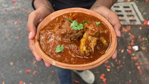 Chamaparan style handi mutton cooked in a hotel in Bihar Stock Footage 310600964