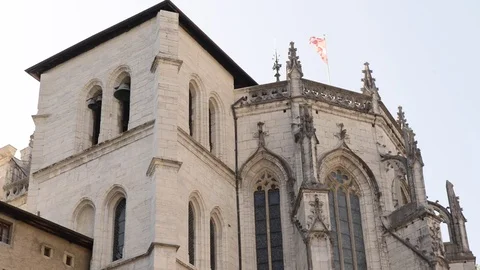 Chambery, savoy flag floating on top of a cathedral Stock Footage 80256546