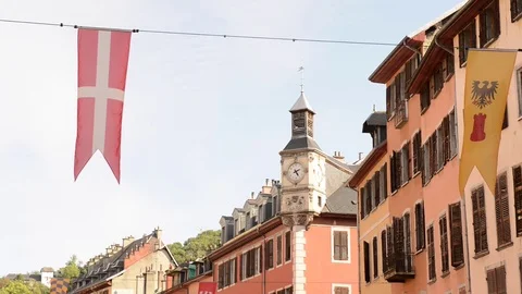 Chambery, Savoy medieval flag floating in main street Stock Footage 80305622
