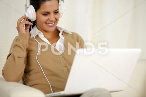 Chaming Young Woman With Headphone Listening Music