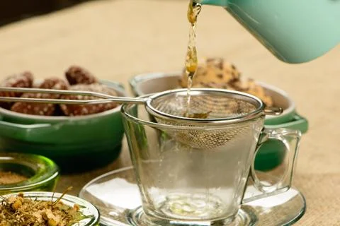 Chamomile tea cup with crackers Stock Photos