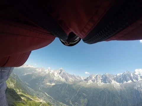 Chamonix Wingsuit BASE jump proximity Stock Footage