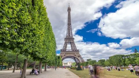 Champ de Mars and the Eiffel Tower timelapse hyperlapse in a sunny summer d.. Stock Photos