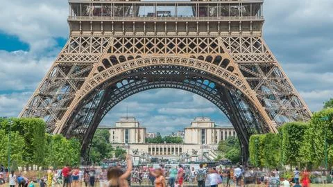 Champ de Mars and the Eiffel Tower timelapse in a sunny summer day. Paris, .. Stock Photos