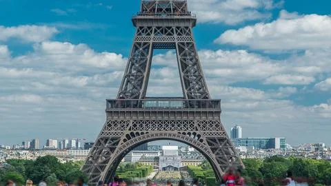 Champ de Mars and the Eiffel Tower timelapse in a sunny summer day. Paris, .. Stock Photos