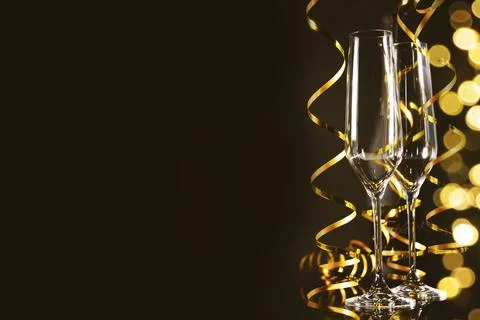 Champagne on the black background Stock Photos