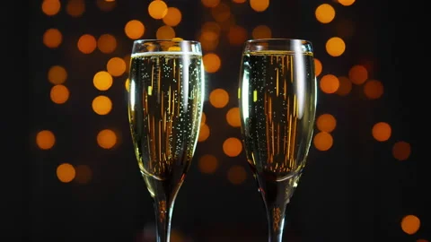 Champagne on a blinking gold background 動画素材 143331029