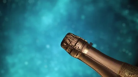 Champagne bottle. Blue blinking background. Stock Footage 110739471