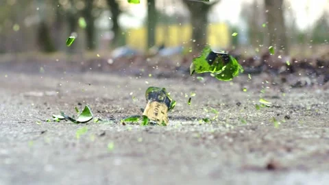 Champagne Bottle Shattering On Ground In Slow Motion Dramatic Impact Scene Stock Footage 325955741