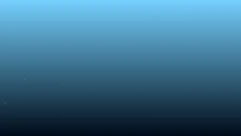 Champagne bubbles are slowly crawling on the glass on a blue background. Stock Footage 101488336