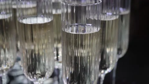 Champagne bubbles in a glass close-up. Stock Footage 142833866