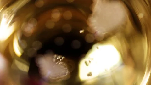 Champagne bubbles in a glass close up macro on dark background. Stock Footage 82647937